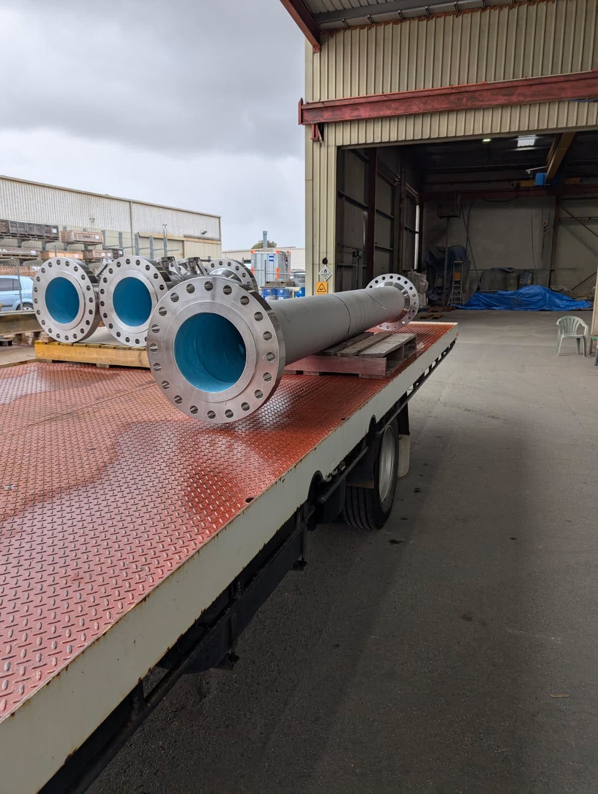 Fabricated duplex spool assembly packed upright for transport