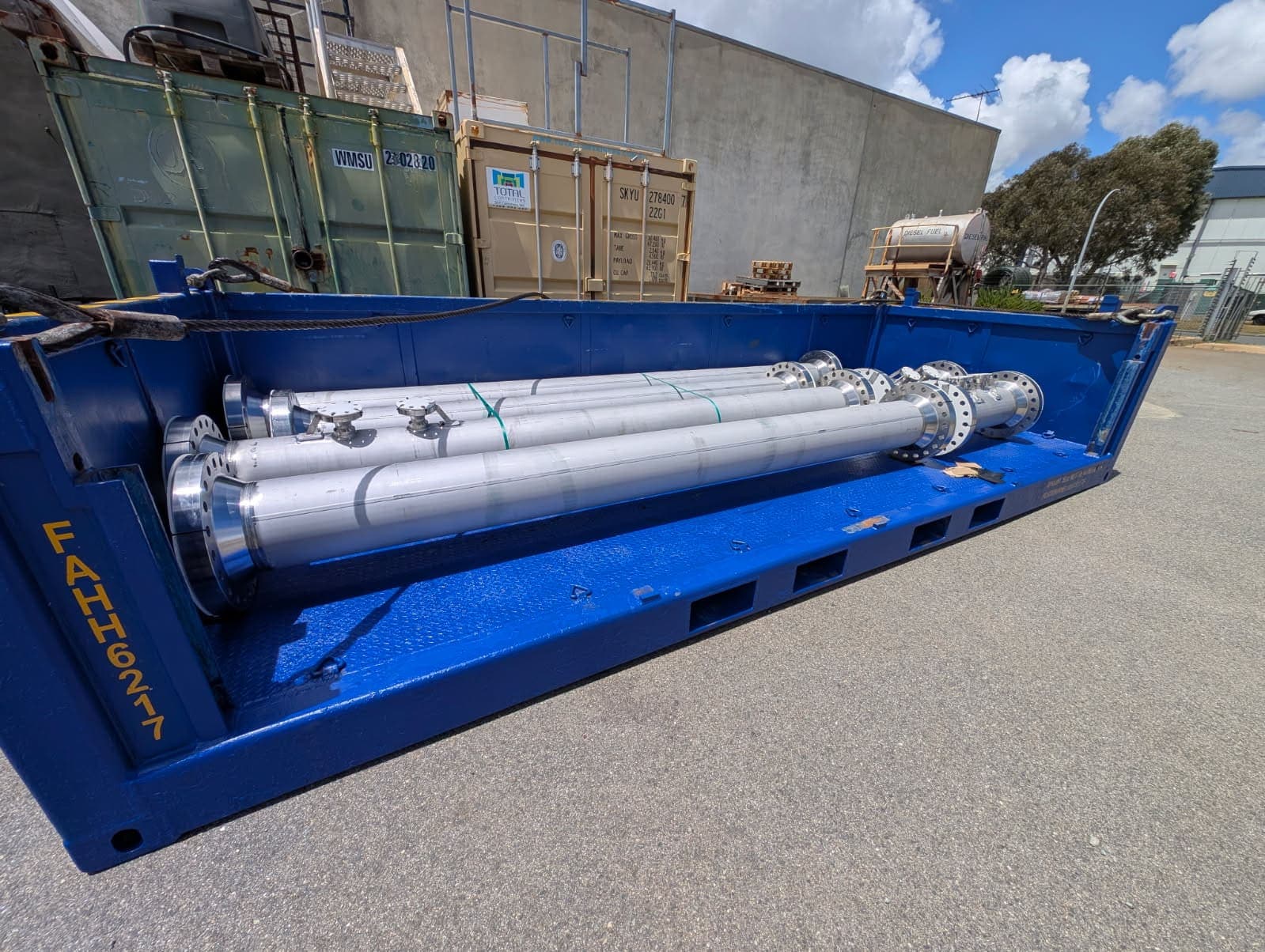 Duplex and super duplex pipe spools secured in a blue transport frame