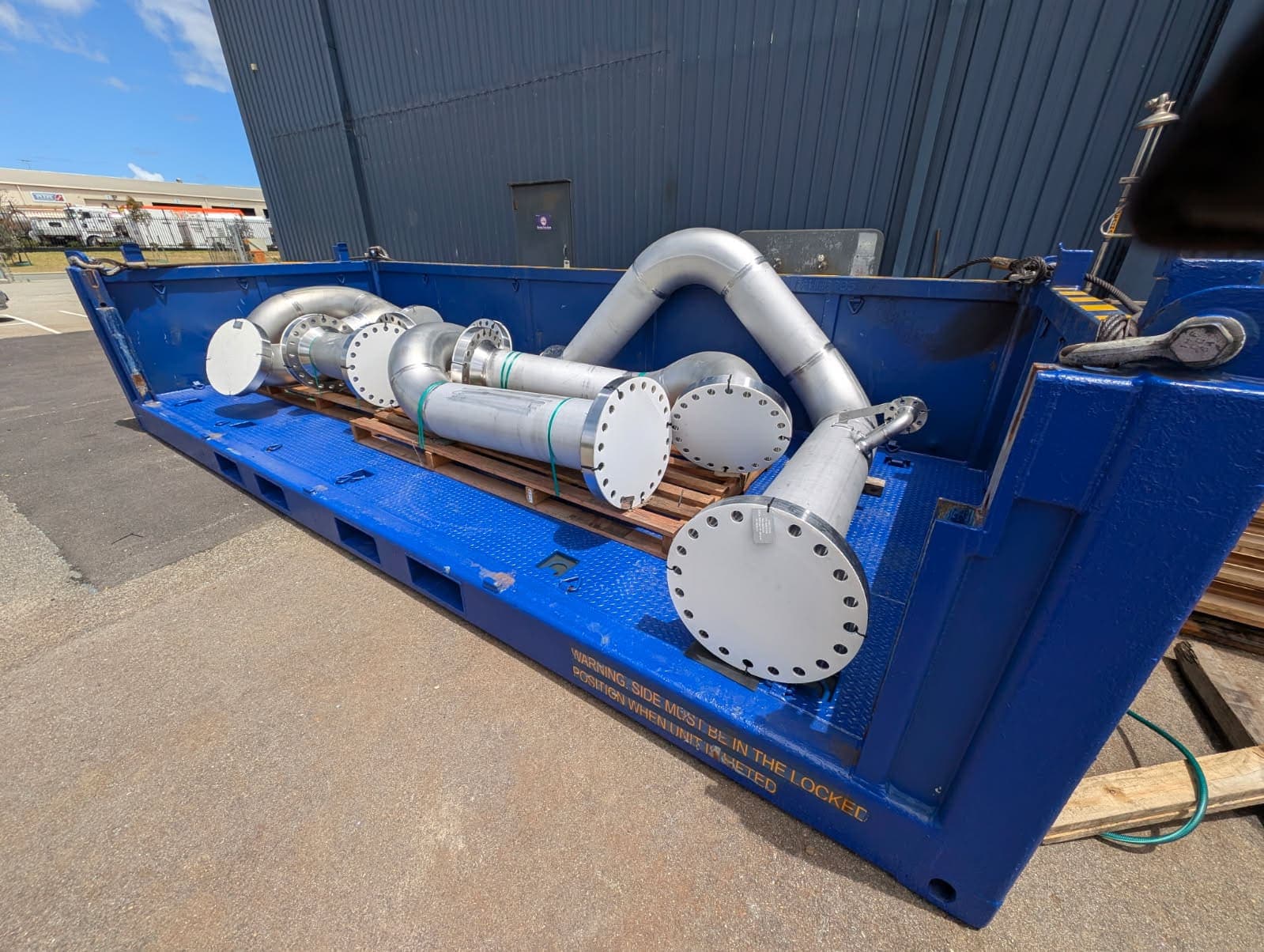 Completed duplex spools with protective flange covers fitted