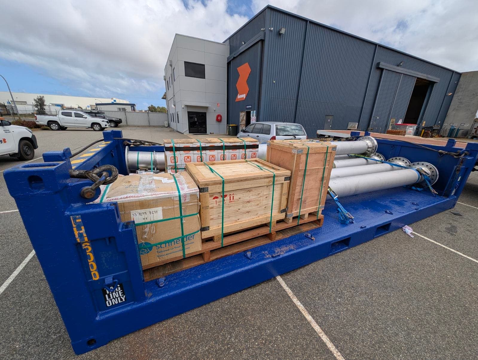 Fabricated duplex spools loaded in a blue shipping frame