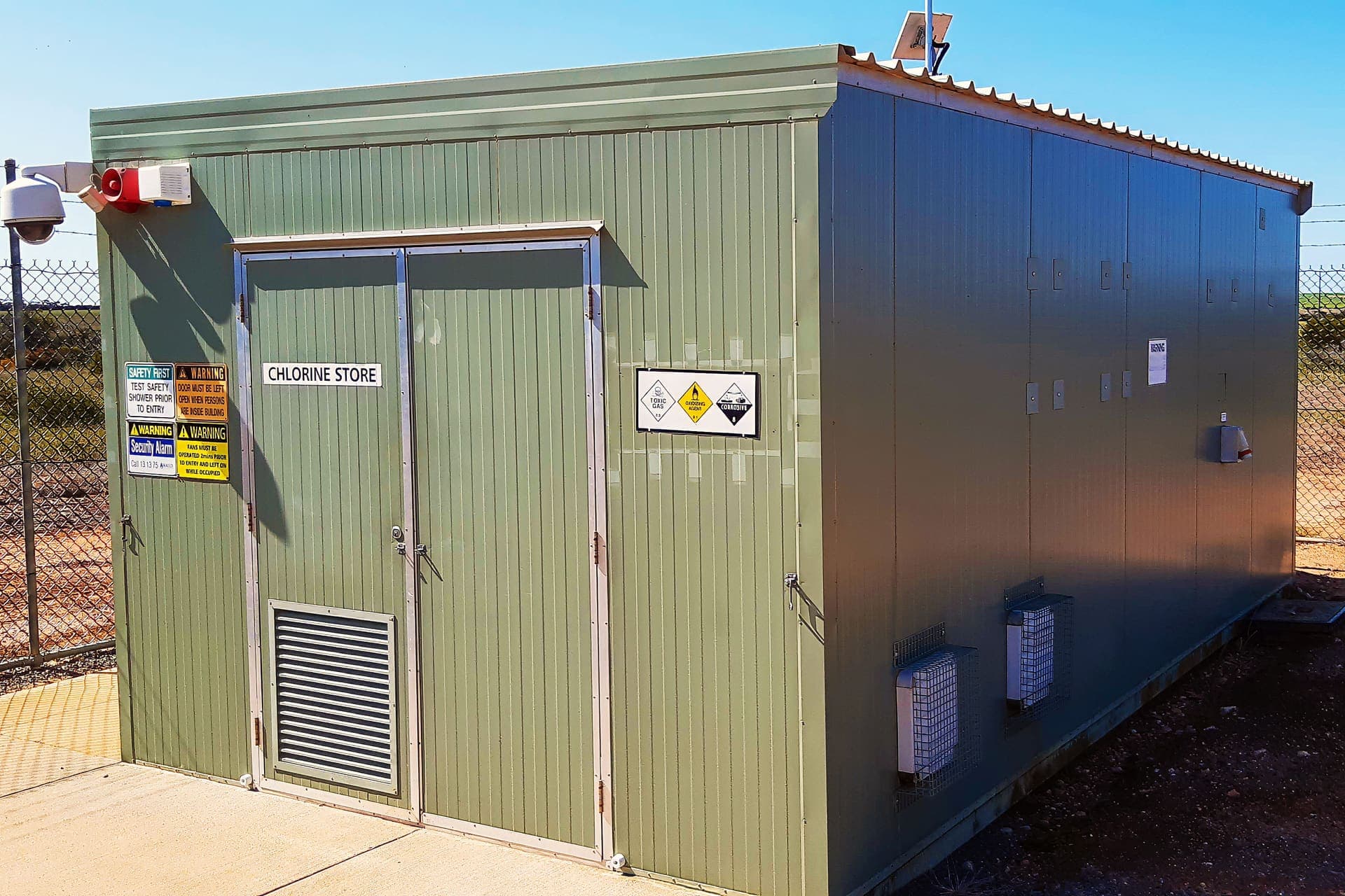 Chlorine store building with hazard signage at the North Lake Grace site