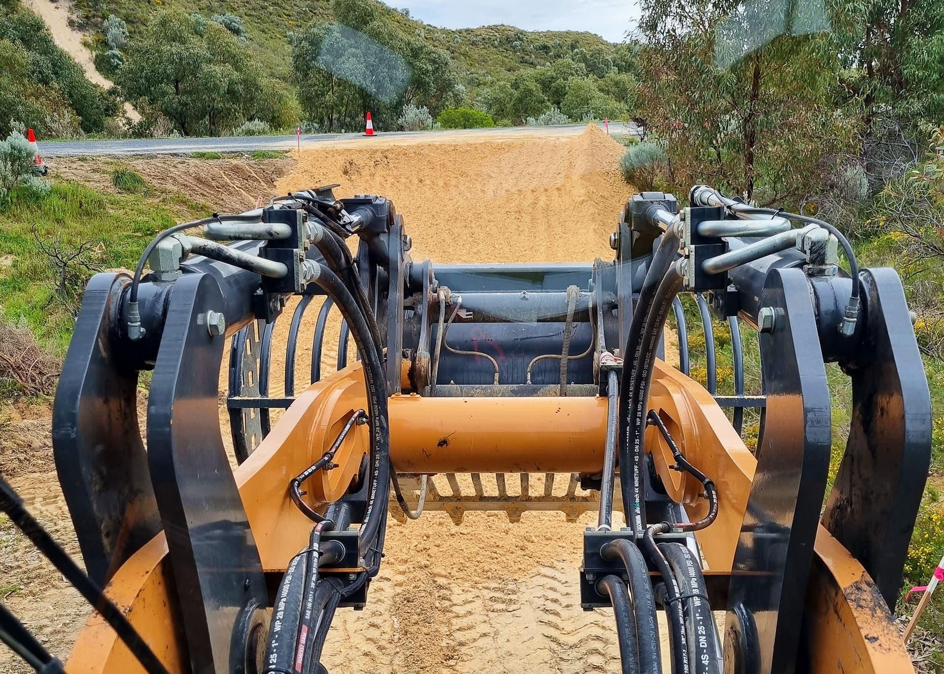 Limestone being spread across the bore pad