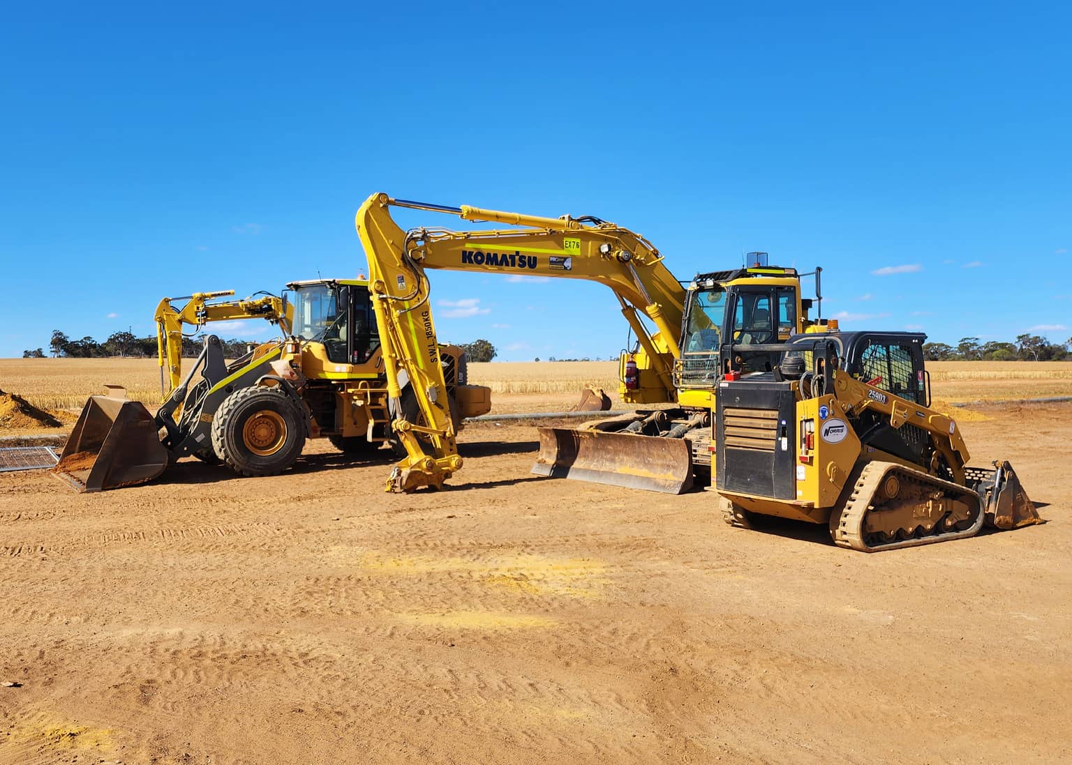 Loader and excavators working the alignment at Narembeen