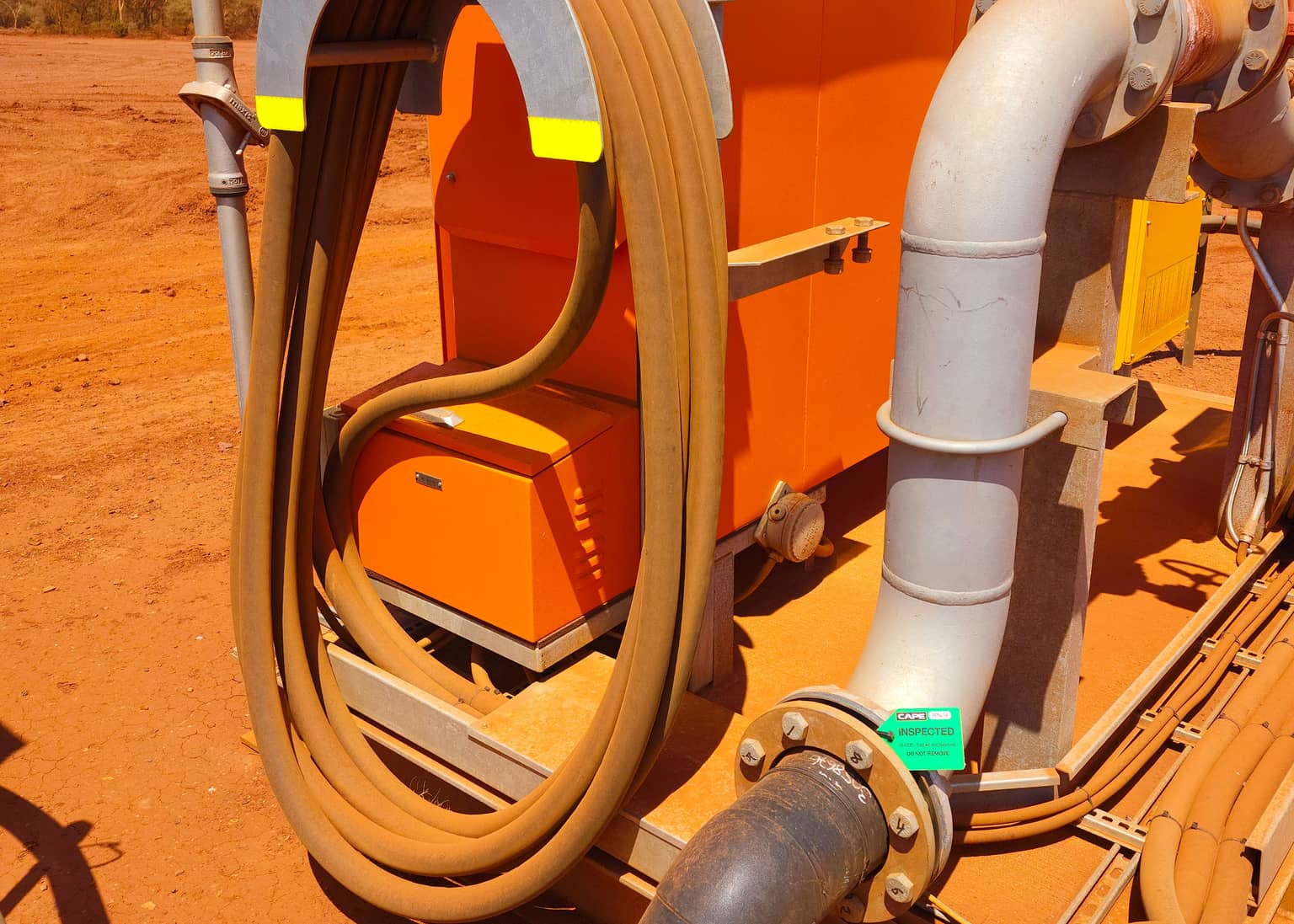 Dewatering pump and layflat hose on the Pilbara site