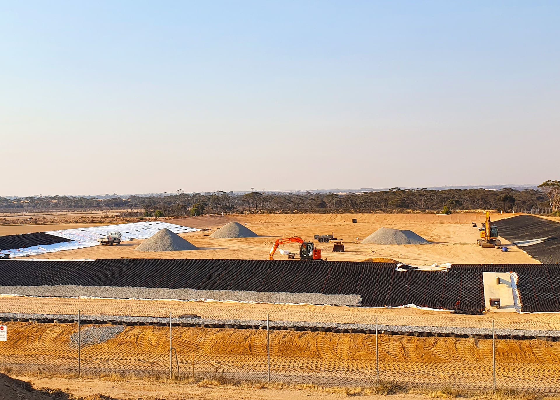 Sand earthworks shaping the new storage pond embankments at the Hyden treatment plant