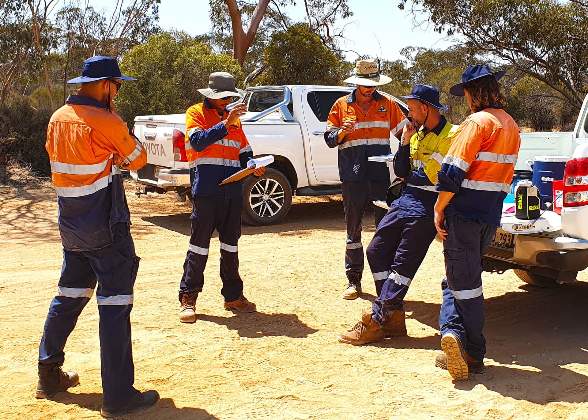 Crew and plant lining the pond base at the Hyden wastewater treatment plant