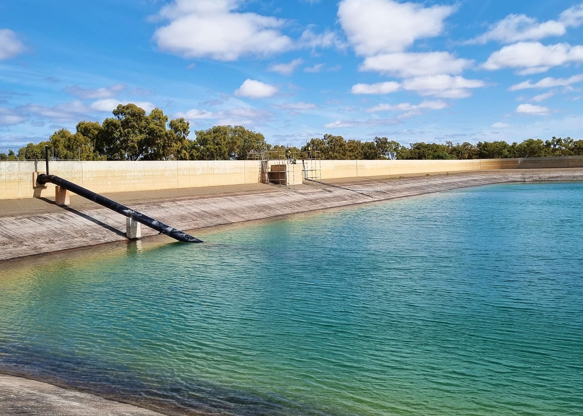 Exclusion barrier installation at the overflow structure