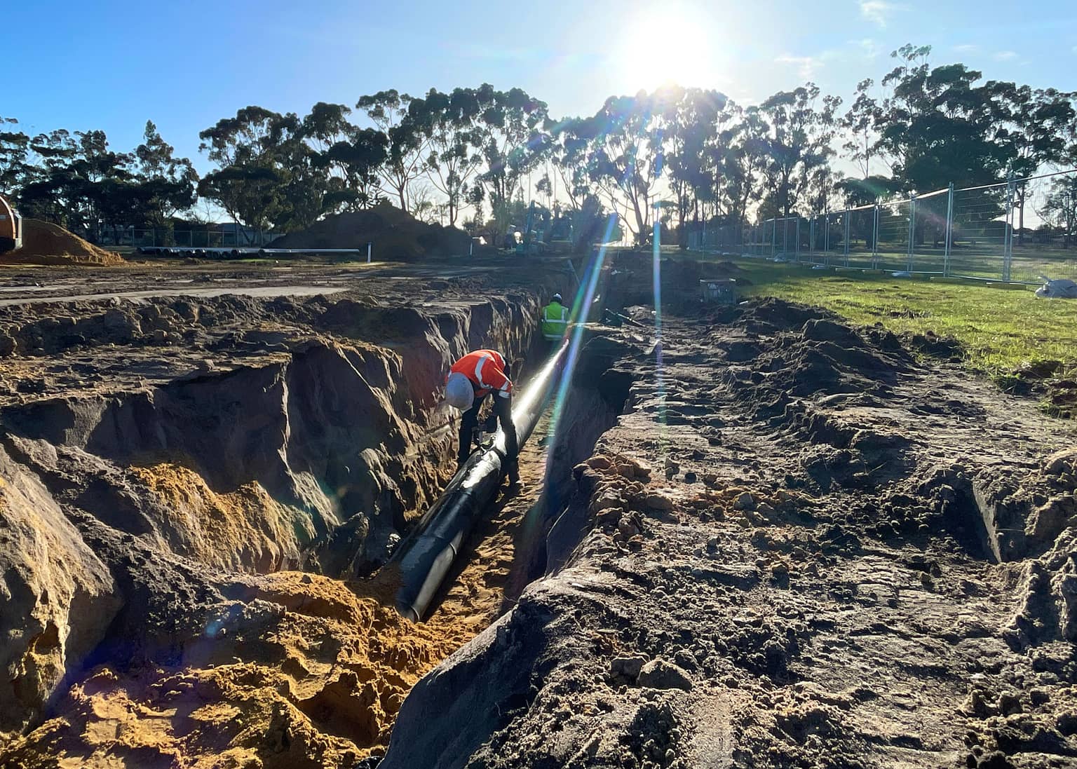 Pipeline through excavated ground at sunrise on the Kojonup to Katanning alignment