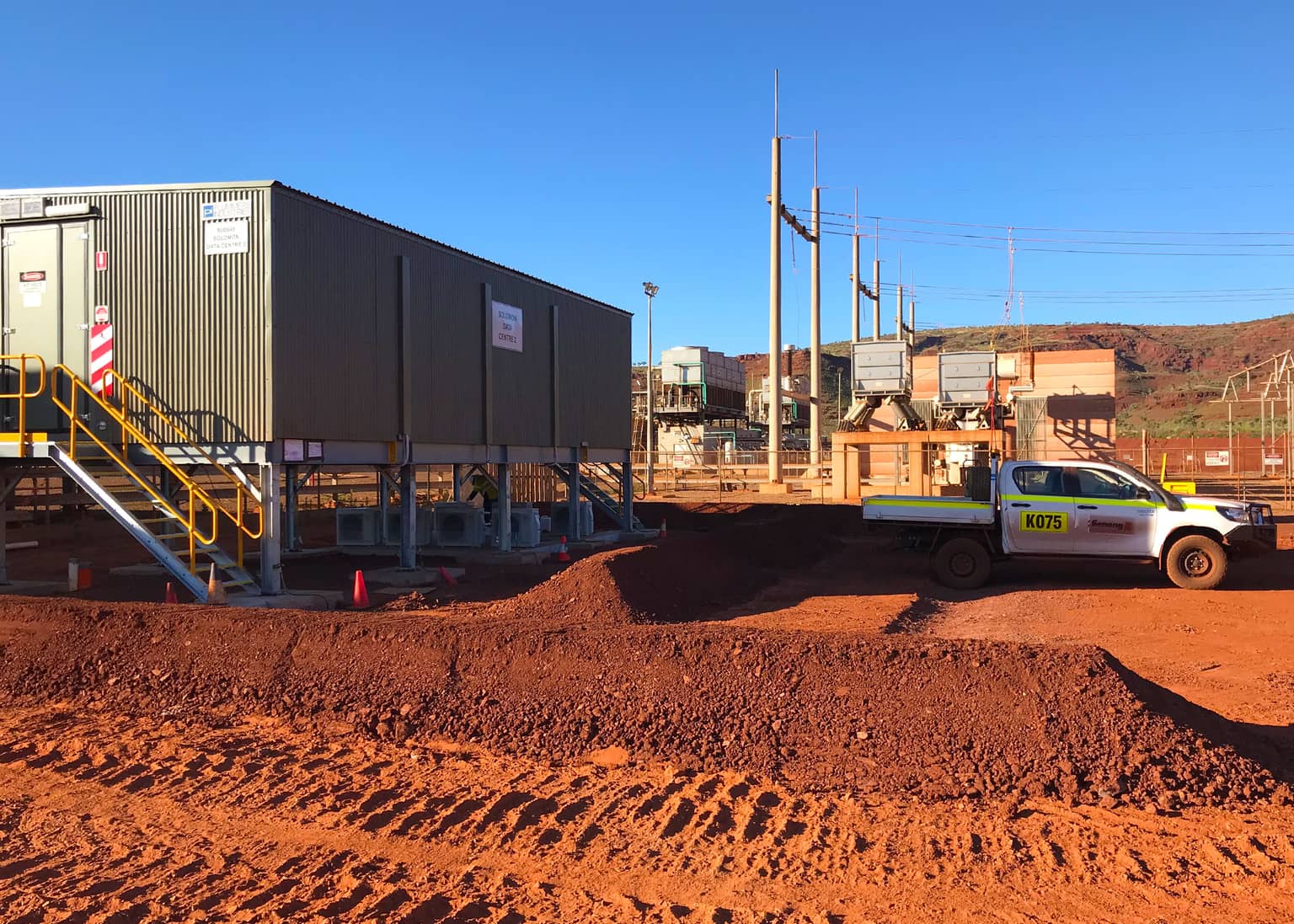 Completed Solomon data centre building with site vehicle