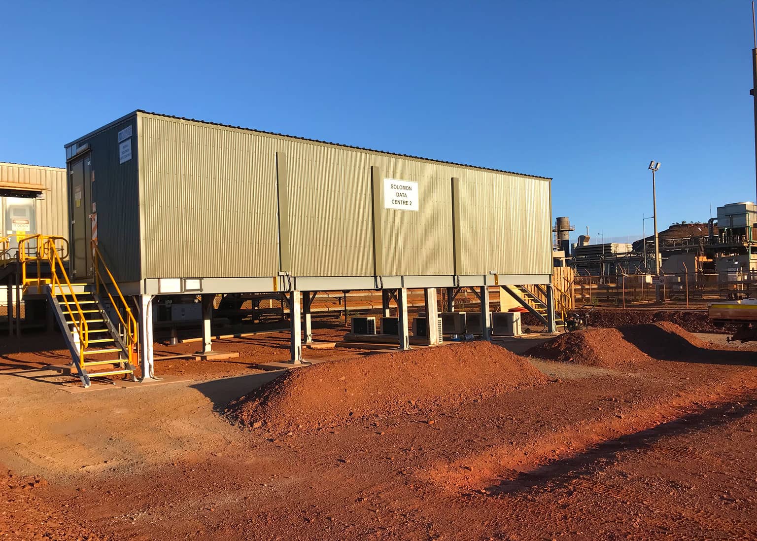 Completed data centre building on elevated footings at Solomon