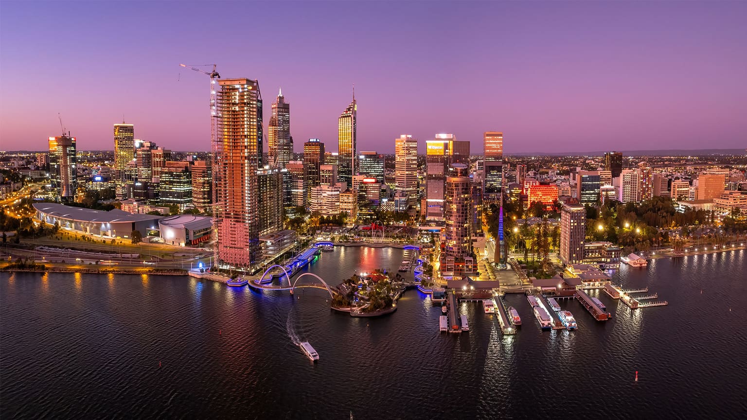 Perth city skyline and Elizabeth Quay on the Swan River at dusk